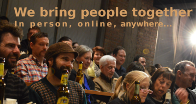 Image of people in tiered seating with the words "We Bring People Together" appearing over the image.